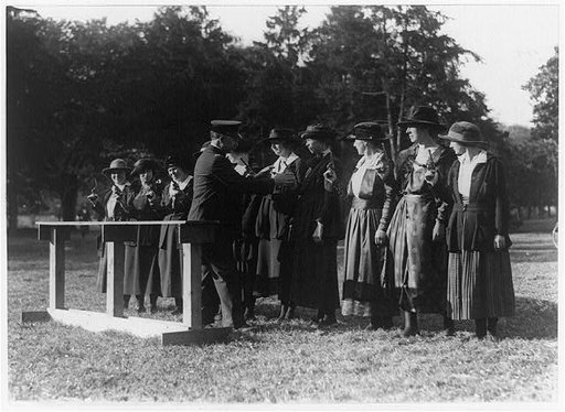 Eleven women police receiving marksmanship training