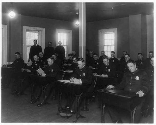 Policemen in classroom