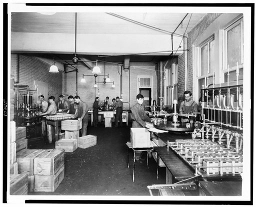 Men working in Pompeian Olive Oil Company