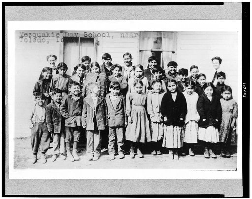 Children and teachers posed outside of Mesquakie Day School, near Toledo, Iowa