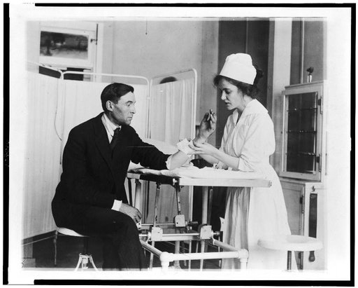 Public Health Service nurse treating patient