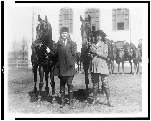 Lucy Leffingwell, daughter of Russell C. Leffingwell, and Carolyn Chamberlain, daughter of General J.C. Chamberlain, posed with their horses, probably in New York City area