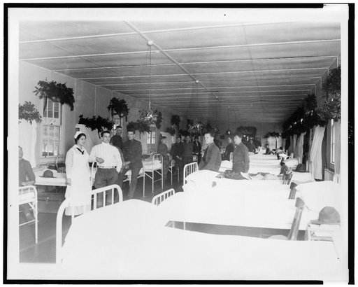 Soldiers and nurse in military hospital, during Christmas season