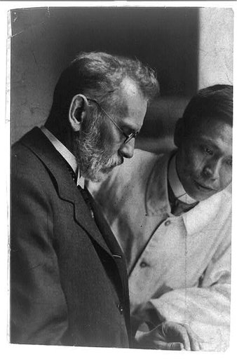 Paul Ehrlich, half-length portrait, standing, facing right, with another man