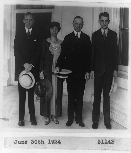 President and Mrs. Coolidge with sons, full-length portrait