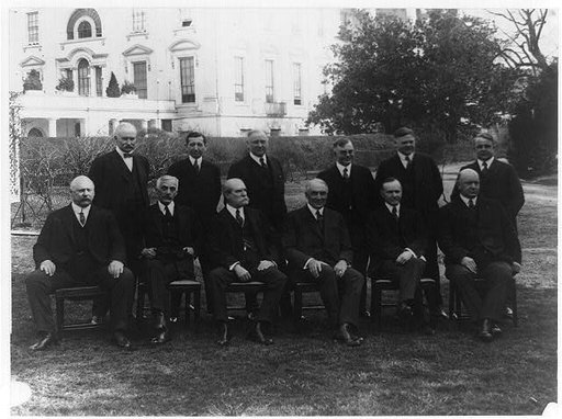 President Warren G. Harding and his cabinet posed on the White House Lawn