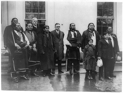 Osage Indians with Senator J.W. Harreld and Rep. S.J. Montgomery at the White House when they called upon President Coolidge