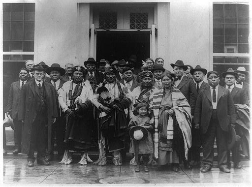 Group of Osage Indians posed outside the White House