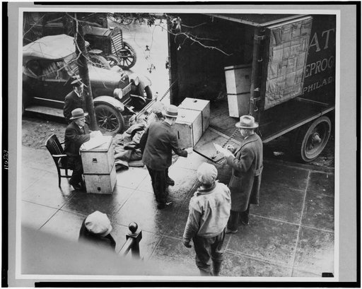 Men removing ballot boxes from the William S. Vare - William B. Wilson Pennsylvania senate election from truck at the Capitol, Washington, D.C.