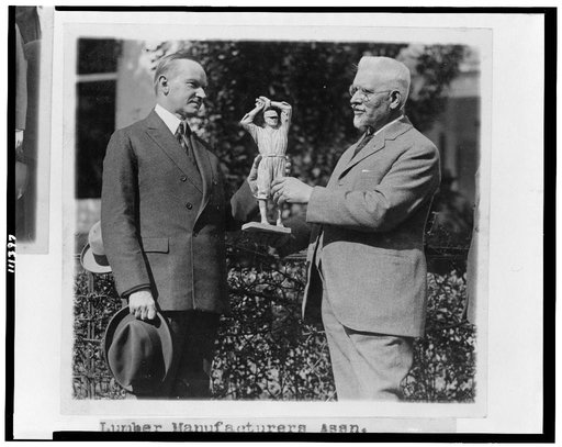 U.S.J. Dunbar presents a statue of Walter Johnson [to President Coolidge