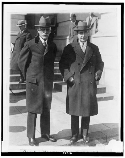 Andrew W. Mellon and Ogden Mills, full-length portrait, facing front, standing outside the Capitol, after closing session of the Sixty-Ninth Congress