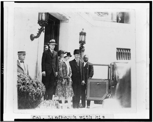 Col. Linbergh[sic] with his mother and President and Mrs. Coolidge leaving the temperary[sic] White House