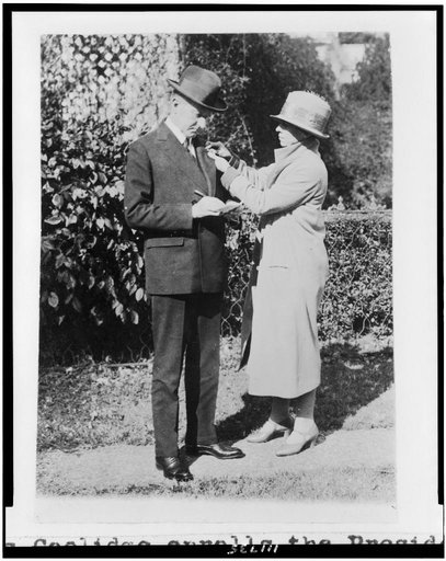 Mrs. Calvin Coolidge enrolls the President in the American Red Cross