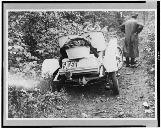 Automobile stuck in ditch on road in New York