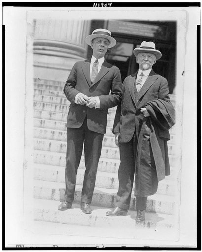 Theodore Roosevelt, Jr. standing on steps with Charles Lathrop Pack, full-length portraits