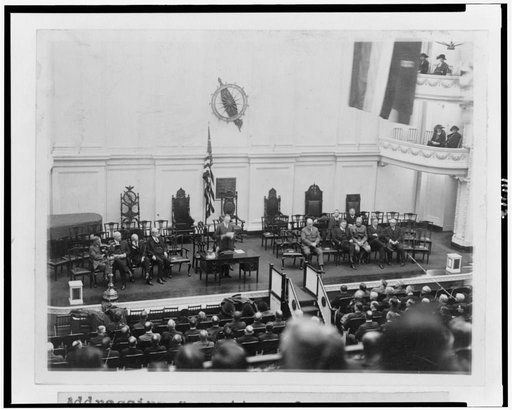 Calvin Coolidge addressing a meeting of the Budget Committee in the absence of President Harding
