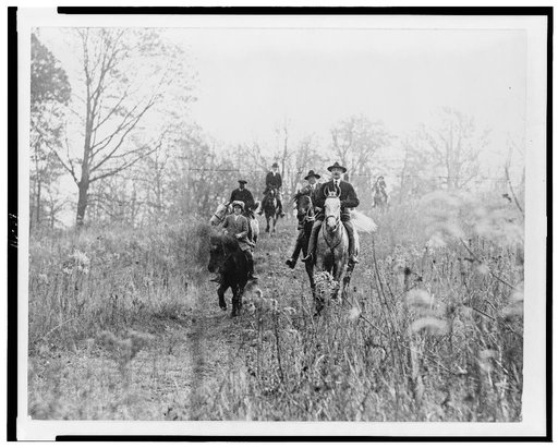 Men and boy on horses during hunt in Virginia