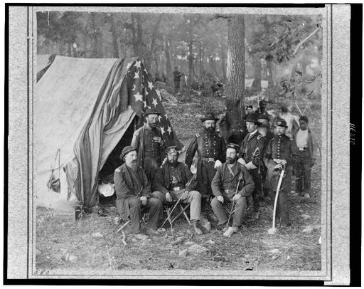 Bv't. Maj. Gen. John C. Caldwell and staff posed in front of tent