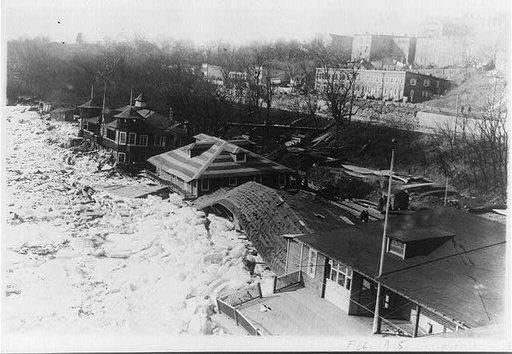 Bird's-eye view of boathouses, along the Potomac River, Georgetown, damaged by flood