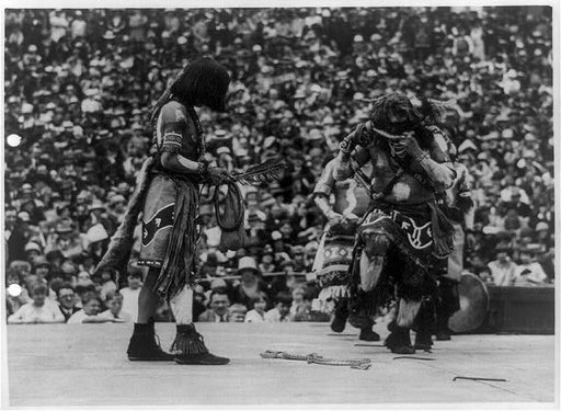Back to the plains at the U.S. Capitol--Hopi Indians from Arizona with their original makeup and real rattlesnakes putting on a religious dance at the Capitol