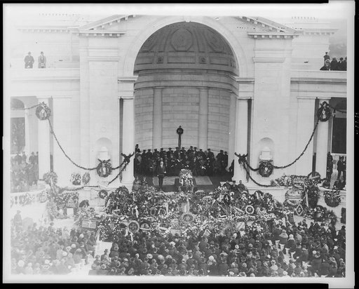 Burial of Unknown Soldier at Arlington National Cemetery, Va.; President Harding standing beside casket, Nov. 11, 1921