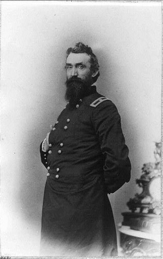 N. Kimball, three-quarter length portrait, standing, facing left; with right hand inside his coat and left hand behind himself
