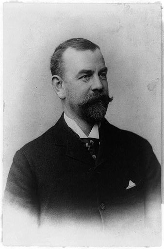 F.G. Bourne, half-length portrait, facing right