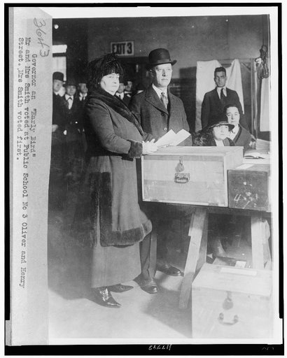 Governor an "early bird"--Mr. and Mrs. Smith voted at Public School No. 3, Oliver and Henry Street