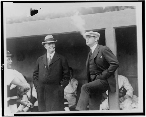 The "Babe" in a reflectice [sic] mode, snaped [sic] in the Wash [Washington, D.C.] dugout before the game--President Ban Johnson seems to enjoy the situation