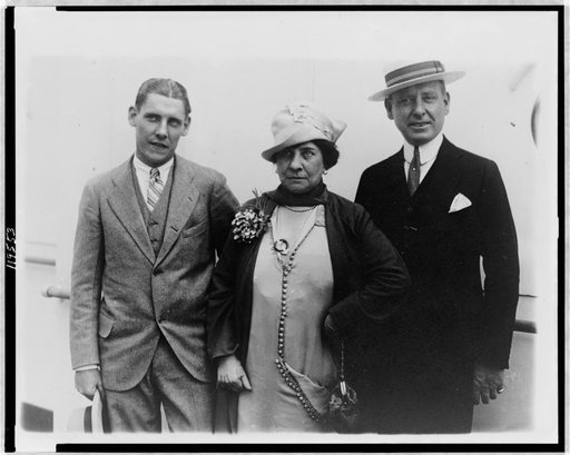 Frank Hague, his wife, and son, Frank, Jr., posed, standing, facing front
