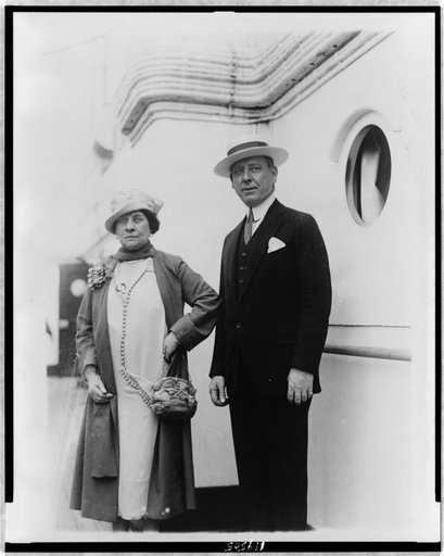 Frank Hague and his wife, posed, standing, facing front