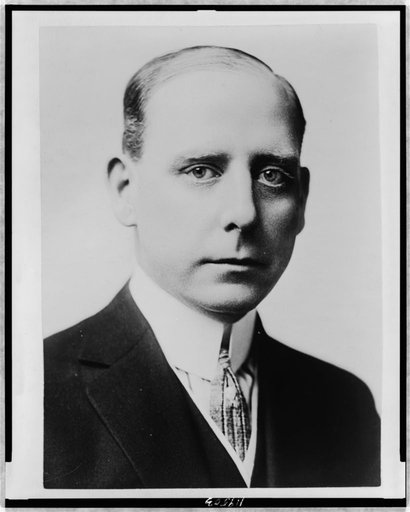 Frank Hague, bust portrait, facing right