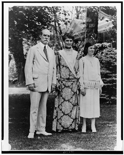 Charles Evans Hughes, wife, and daughter, standing on lawn