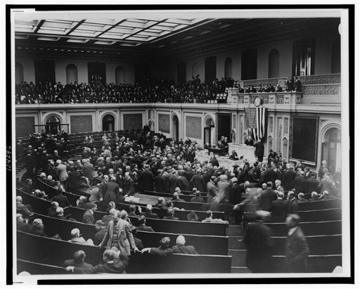 Scene at the opening of the House of Representatives today--Members left their seats to hold an informal reception before the Speaker's desk--Speaker Gillette [sic] is shown in the chair