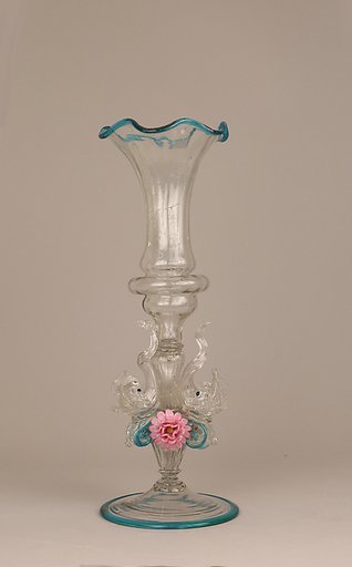 Fluted vase with dolphins
