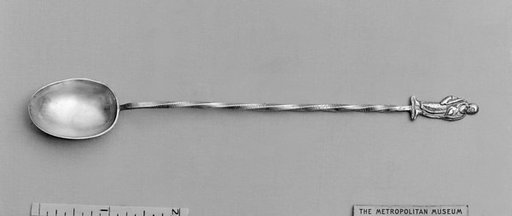 Figure-top spoon