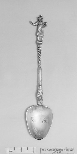 Figure-top spoon