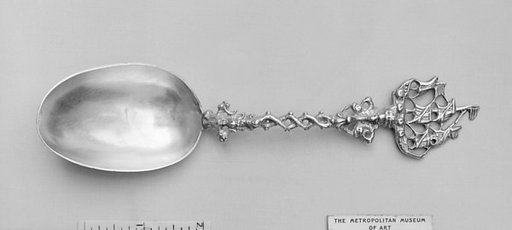Figure-top spoon