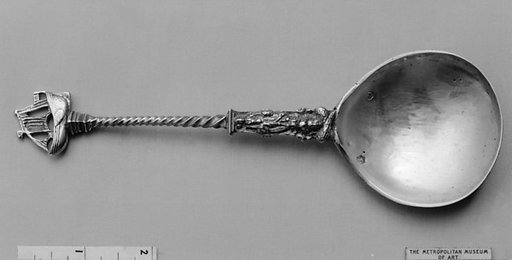 Figure-top spoon