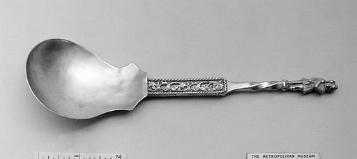 Figure-top spoon