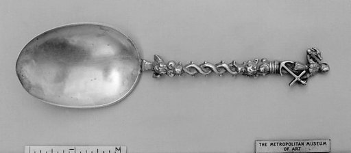 Figure-top spoon