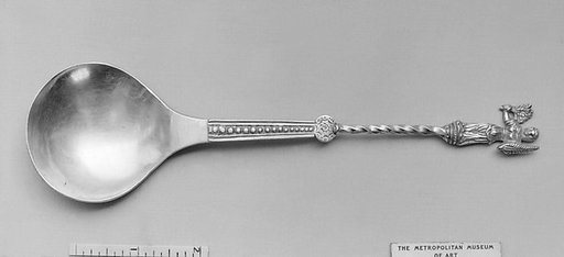 Figure-top spoon