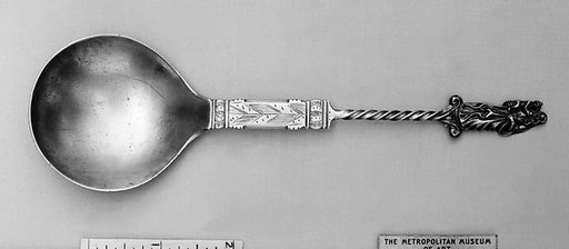 Figure-top spoon