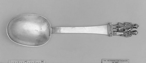 Figure-top spoon