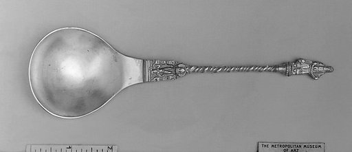 Figure-top spoon