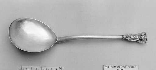 Figure-top spoon