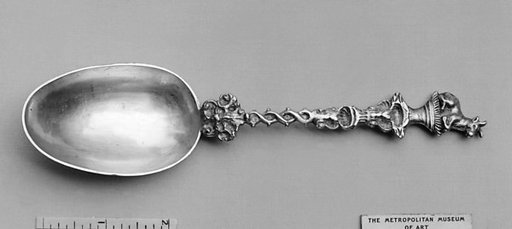 Figure-top spoon