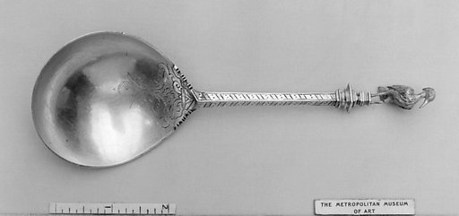 Figure-top spoon