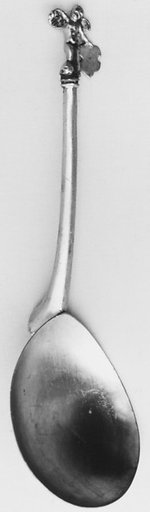 Figure-top spoon
