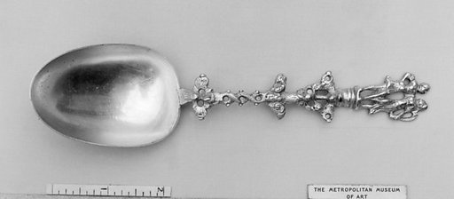 Figure-top spoon